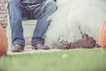 bride and groom in cowboy boots 