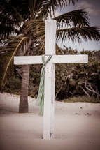 white cross on a beach 
