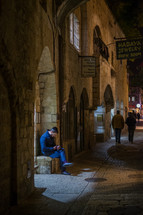 people walking sidewalks in Jerusalem 