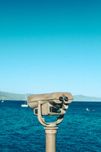 viewfinder scope overlooking the ocean 