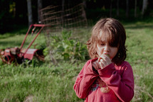 a child eating an apple 