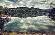 Dramatic landscape of a lake in cloudy weather. Lake San Cipriano, in Tuscany 