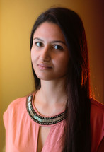 Portrait of woman in pink shirt