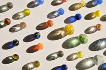 Colorful marbles with shadows