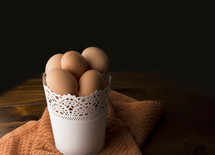 brown eggs in a bucket