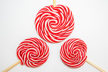 Christmas lollipops on a white background. Christmas candy. Background for Christmas related things.