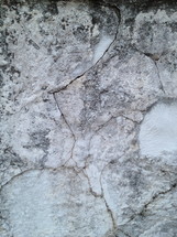 A cracked concrete wall