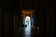 woman and child in a hallway of a church in Taguig Philippines