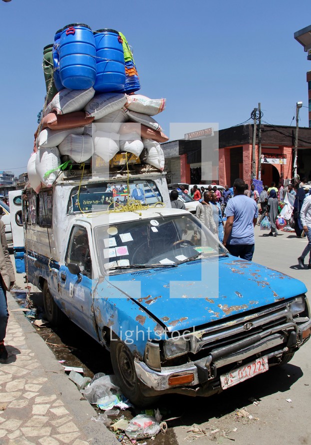 Overloaded Truck Transporting Goods 