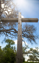 wooden cross outdoors in spring 