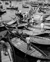 Boats with fishermen in Dhaka river in Bangladesh