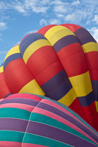Close up shot of two colorful hot air balloons