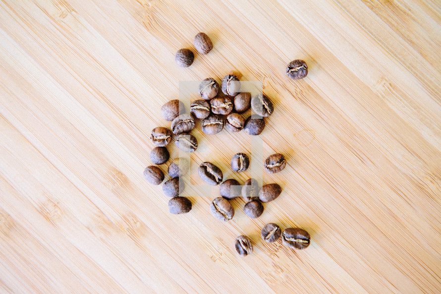 Coffee beans on table top view
