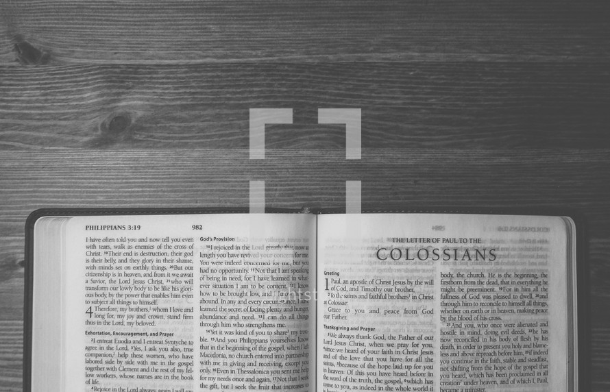 Open Bible on a table.