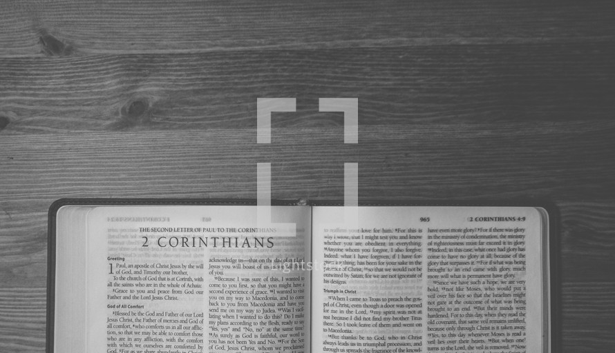 Open Bible on a table.