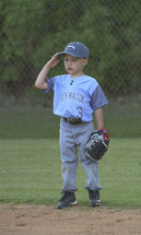 a child on a baseball field 