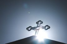 cross on top of a church roof in the Middle East