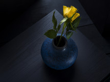 yellow rose in a vase 