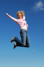 woman leaping into the air 