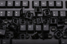 Help spelled out on a computer keyboard 