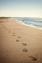 Footprints on the beach without people