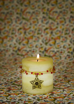 Christmas candle with jewels and star, Florentine illuminated manuscript background