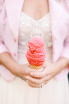 woman holding an ice cream cone 