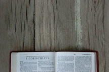 A Bible opened to 1 Corinthians 