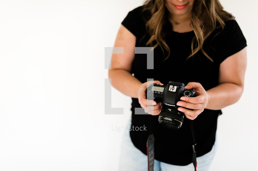 photographer looking at a camera 
