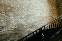 Brick wall and iron staircase with copy space