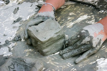 hands shaping clay 