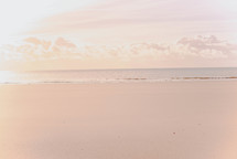 smooth sand on a beach at sunrise 