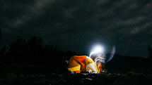 glowing tent at night