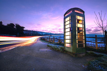 telephone booth along the side of the road 