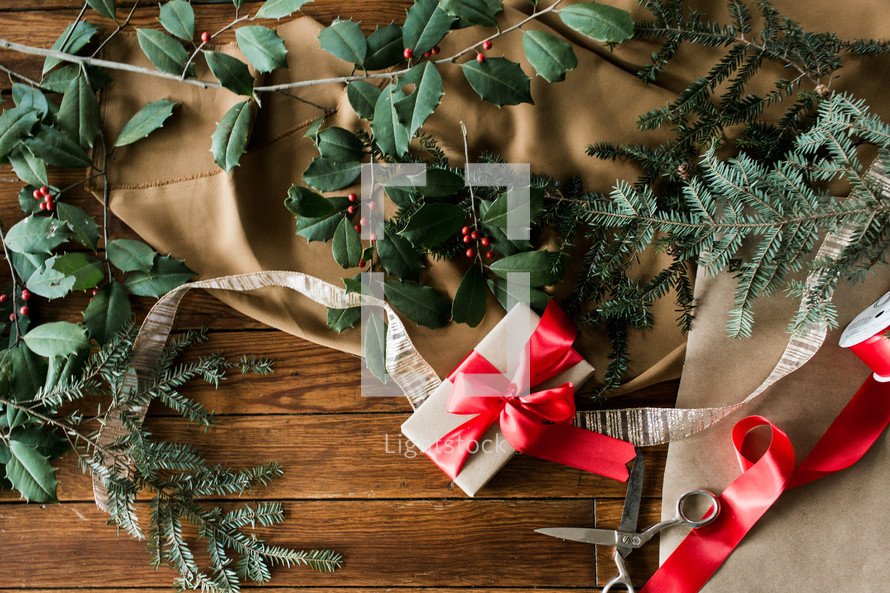 holly branches and gift wrap 