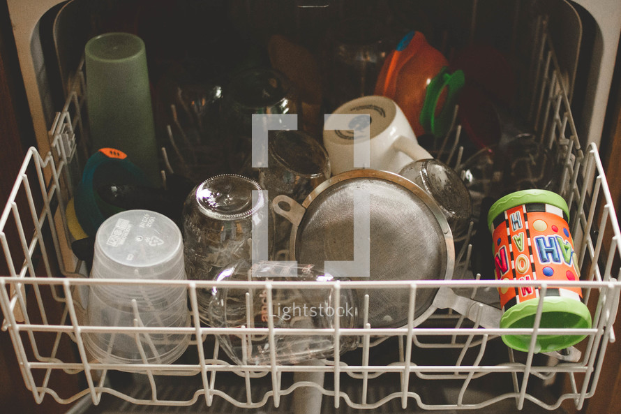 Dishes in a dishwasher.