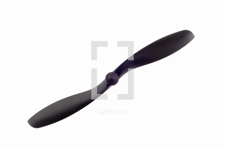 Close up view of a black propeller isolated on white background. Drone propeller