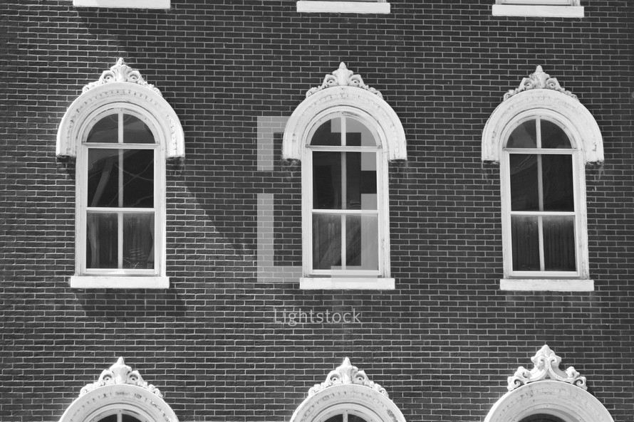 windows on a brick building 