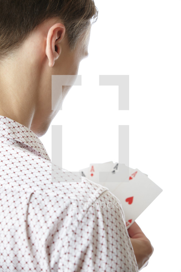 a man holding Aces 