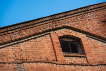 Red brick building and old window