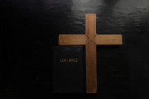 Holy Bible and wooden cross 