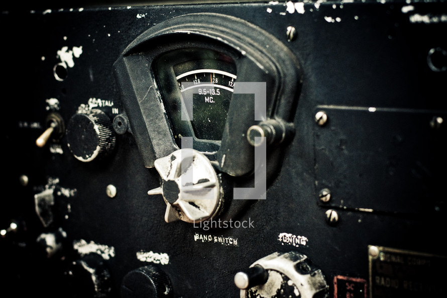 dials on a military communication radio