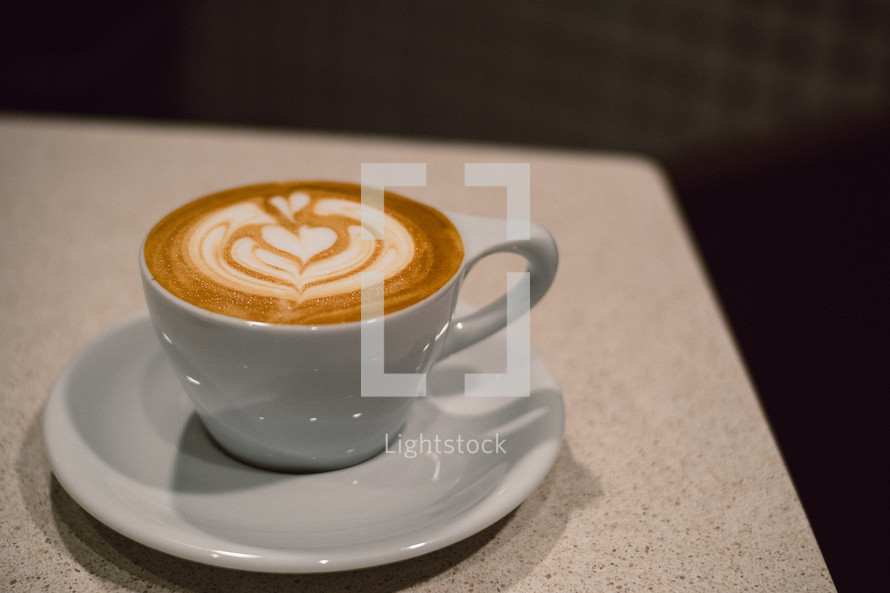 heart shape creamer design in coffee cup 