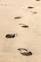 shoe prints, footprints, sand  