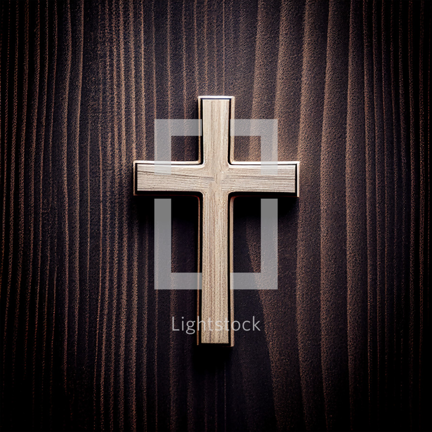 Simple wood cross on wood background