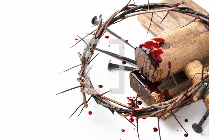 Bloody nails, crown of thorns with drops of blood over white background. Good Friday, Passion of Jesus Christ. Christian Easter holiday. Crucifixion, resurrection of Jesus Christ. 