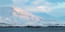 The mountain of Kistufell in the Esja range, across the bay from Reykjavik, catching the light of the rising sun