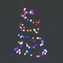 colorful bokeh lights on a Christmas tree 
