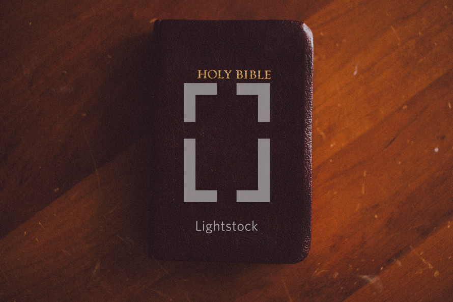 Holy Bible on a wood floor 