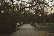 wooden footbridge at a park 